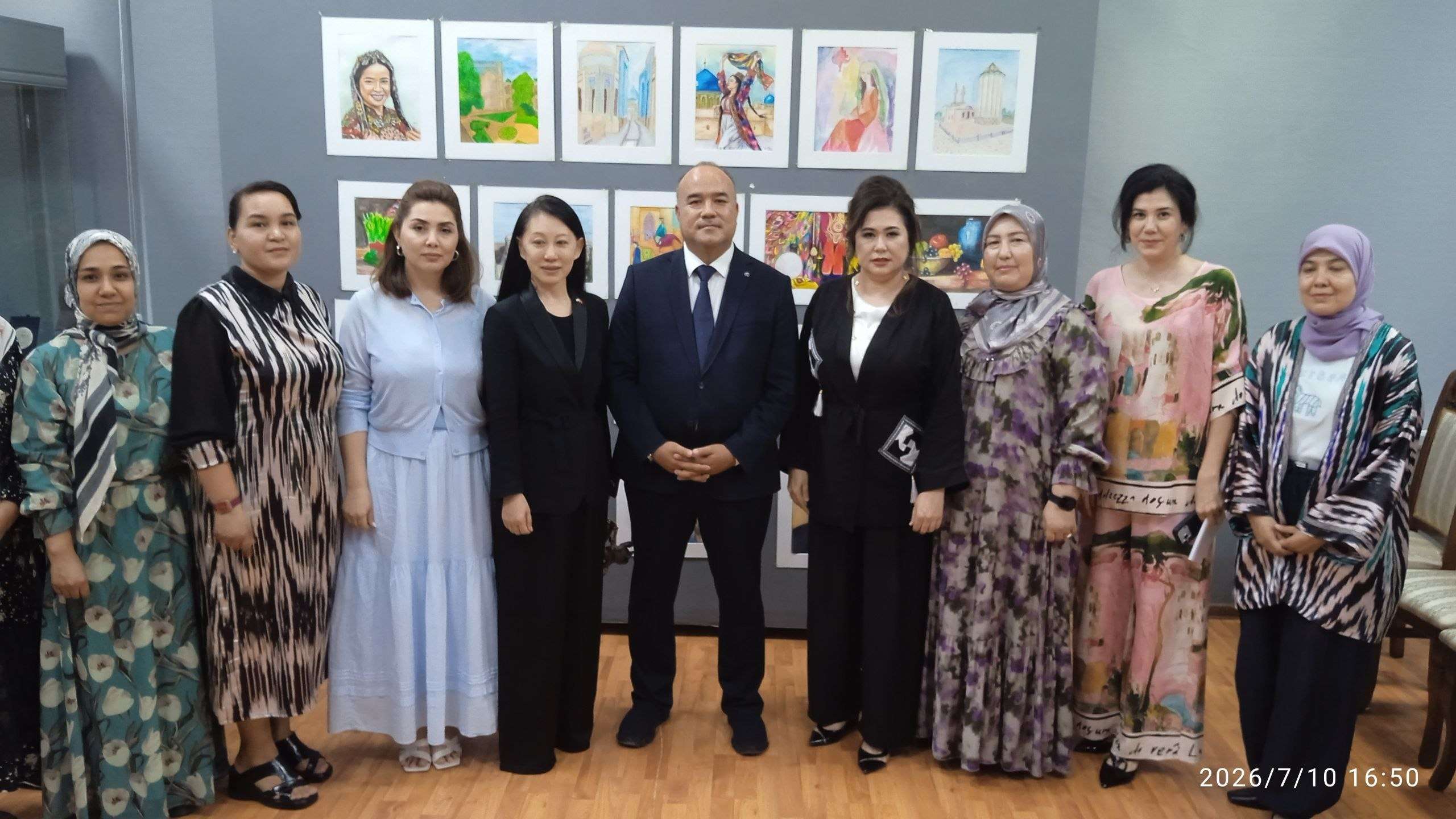 Delegation and hosts gathered for a formal group photograph
